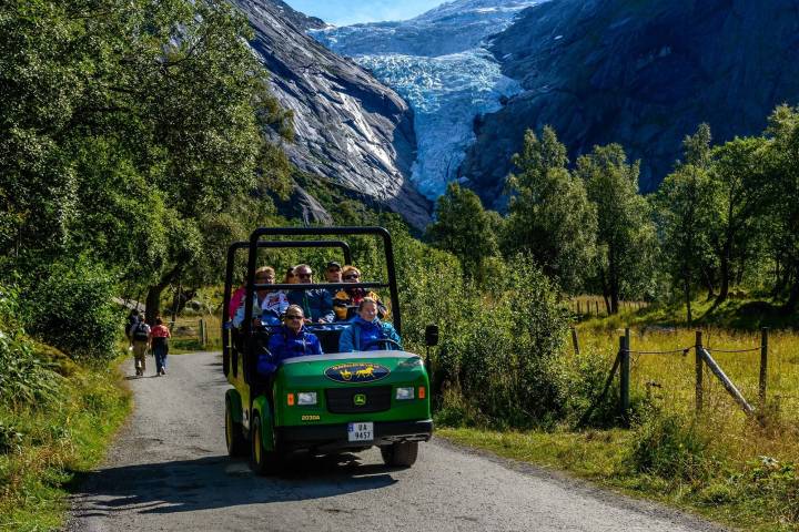 Tourist in a open car in a natural park