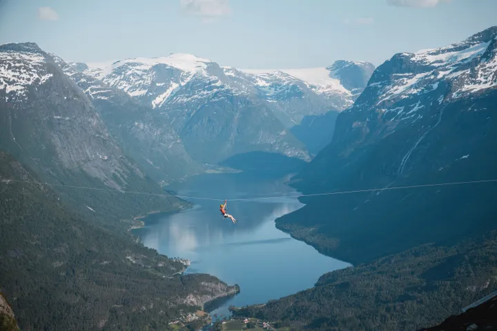 a view of a large body of water with a mountain in the background