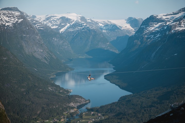 a view of a large body of water with a mountain in the background